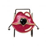 <div class="Standard"><span style="font-size: small;">Steel, gold-plated, silver, black or rose gold and anti-allergy jewel</span></div>
<div class="Standard"><span style="font-size: small;">In the shape of lips, covered with fuchsia enamel and with a black rhinestone in its center.</span></div>
<div><span style="font-size: small;">The displayed price is for one piece - You will need 2 pieces for the cuffs of pants or shorts, shirt sleeves or shoes.&nbsp;(Identical or mismatched pieces)</span></div>
<div class="Standard"><span style="font-size: small;">Tissue paper packaging (free) - Our gift box (for 2 pieces) is sold separately, see in our &laquo;&nbsp;SHOP&nbsp;&raquo; section</span></div>